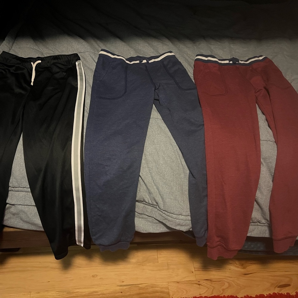 Boys joggers. Black pair never worn. Other 2 excellent condition.